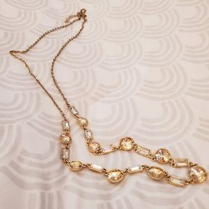 Long gold jeweled necklace